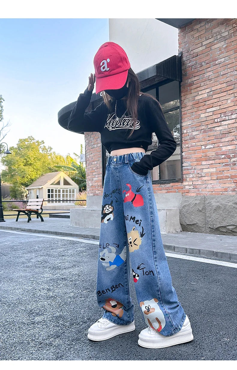 New 2024 Teenage Girls Blue Street Cartoon Print Elastic Mid Waist Loose Denim Jeans Spring Fashion Children Cute Wide Leg Pants