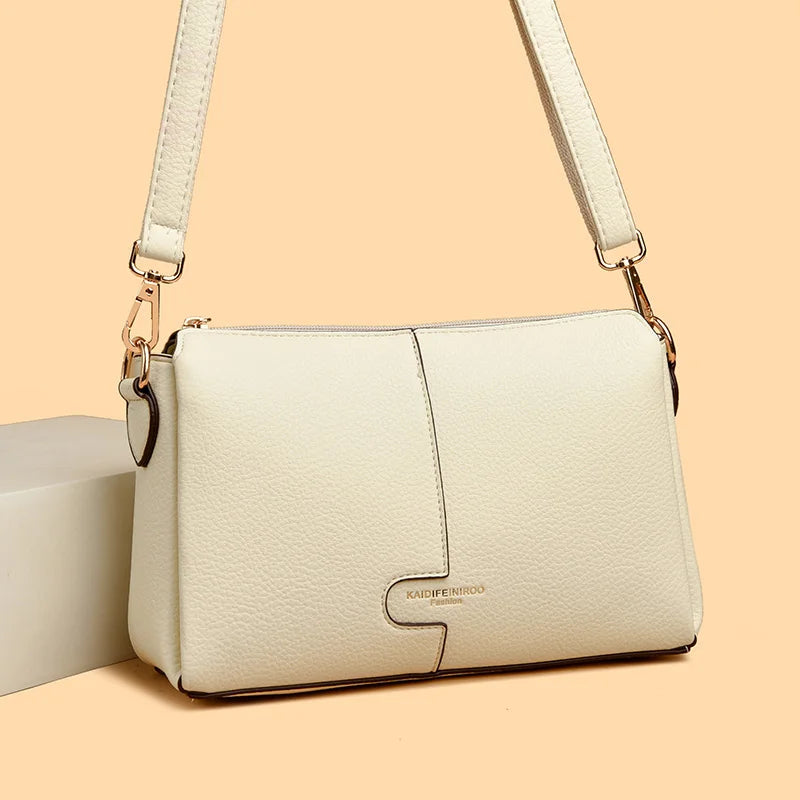Three-Compartment Tassel Bucket Bag